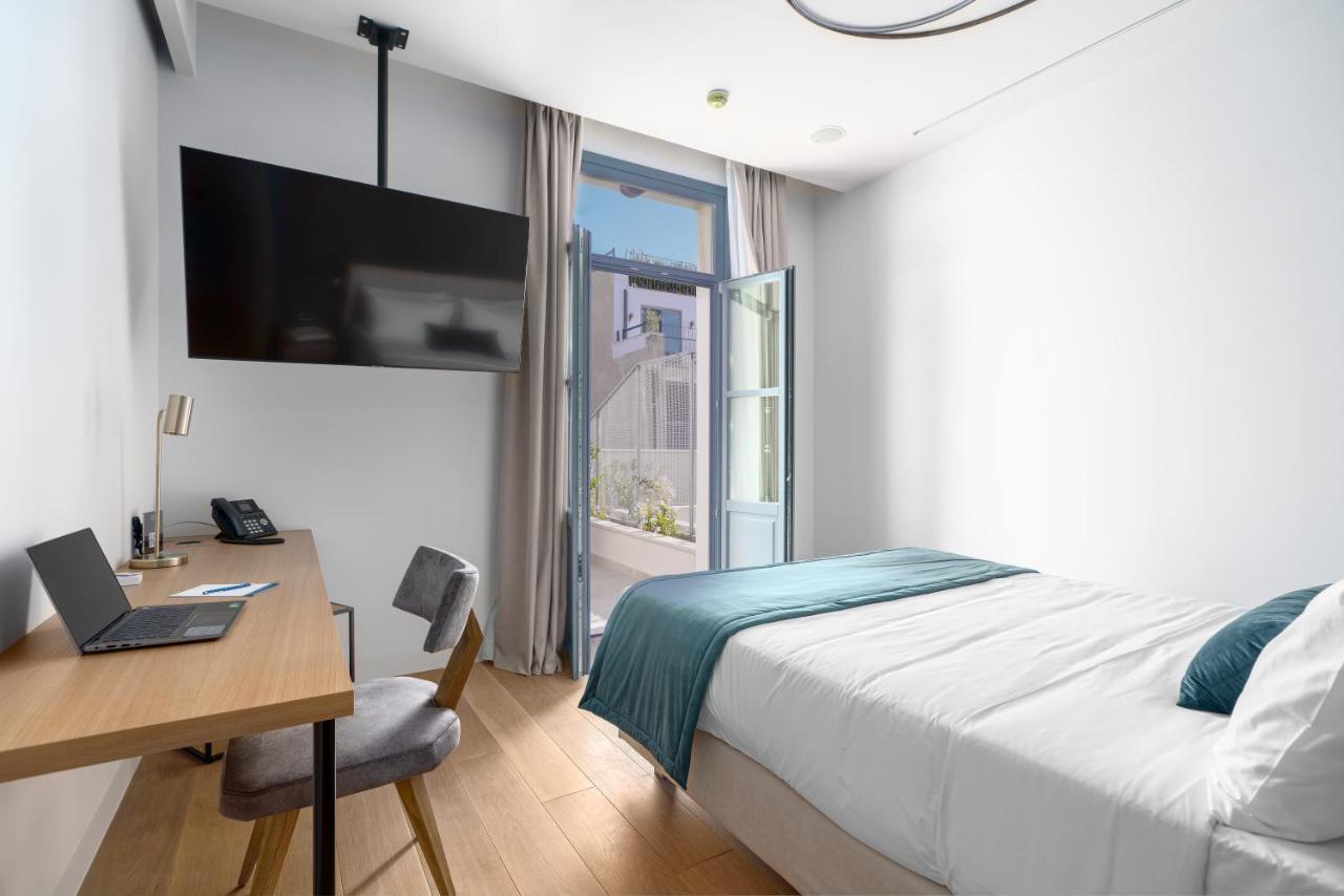 Hellenic Vibes Smart Hotel أثينا المظهر الخارجي الصورة A room at the hotel